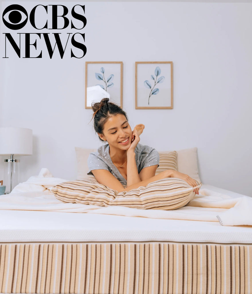 Image showing woman lounging on an Essentia mattress and pillow