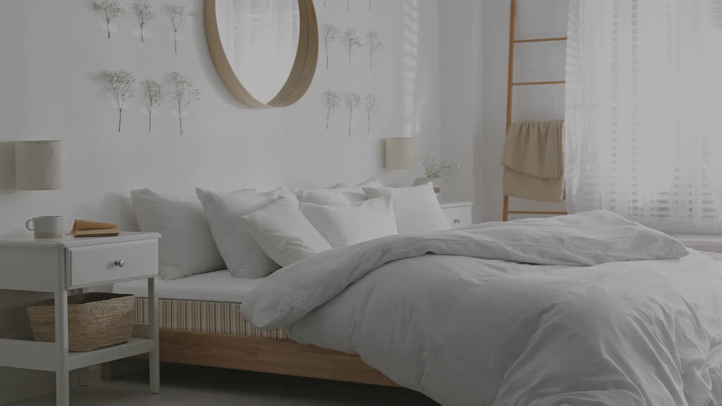 Essentia mattress in a clean bedroom with a white duvet