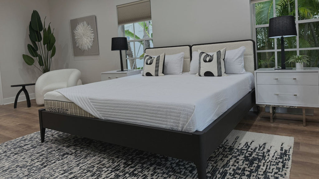 Essentia mattress in a clean bedroom with tasteful accents.