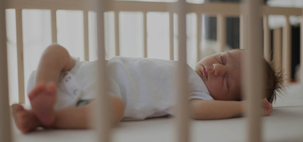 Baby sleeping in crib.