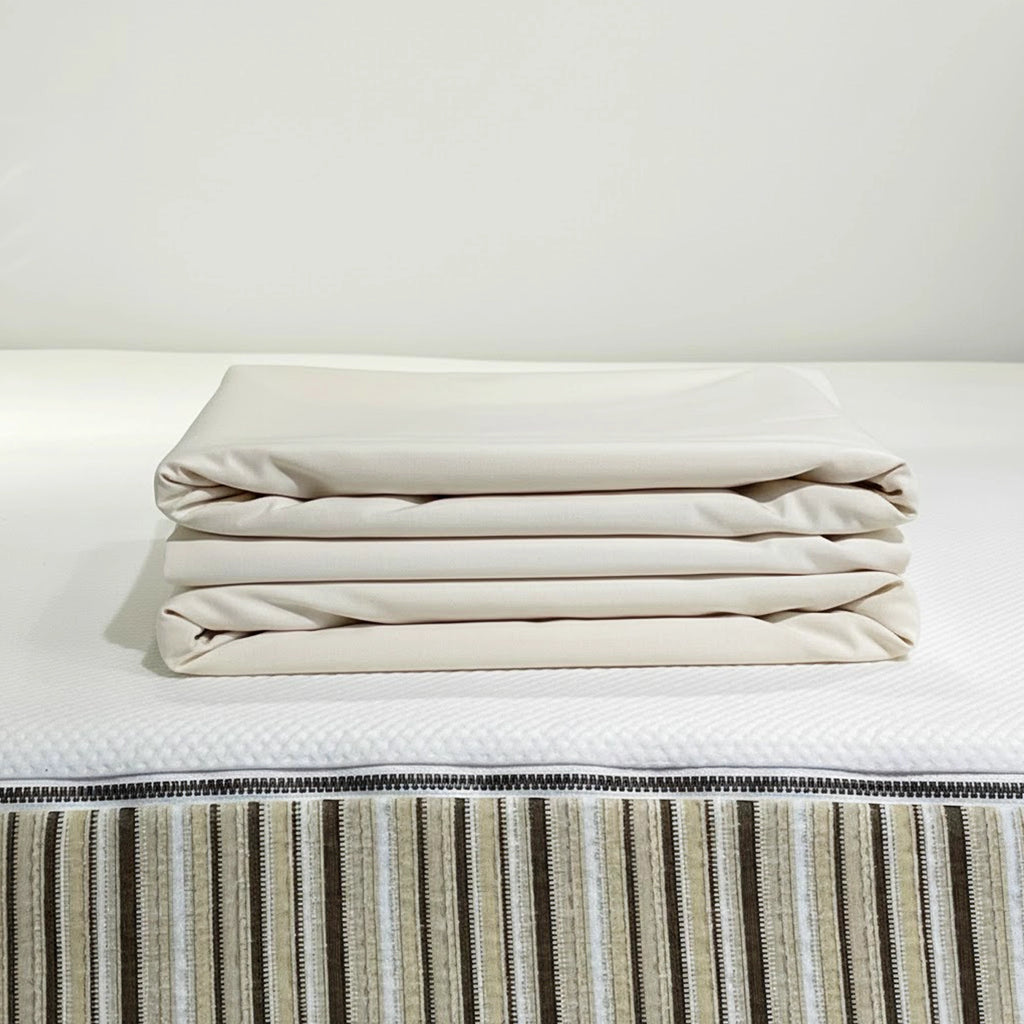 folded bodyguard mattress protector on an Essentia mattress