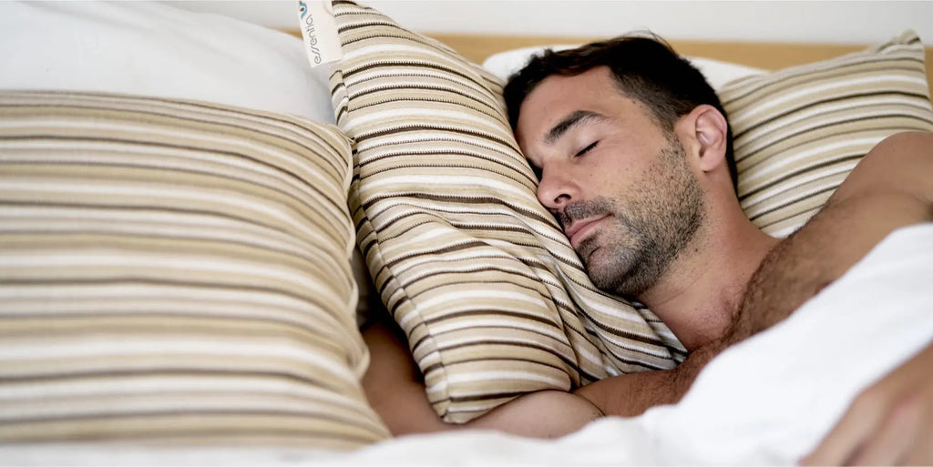 Man asleep on Essentia Procor organic mattress