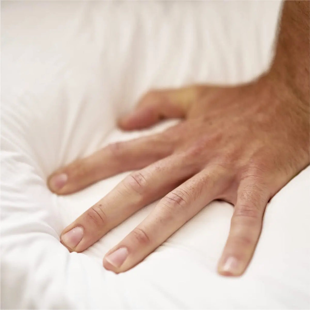 hand testing softness of EssentiaProcor bed
